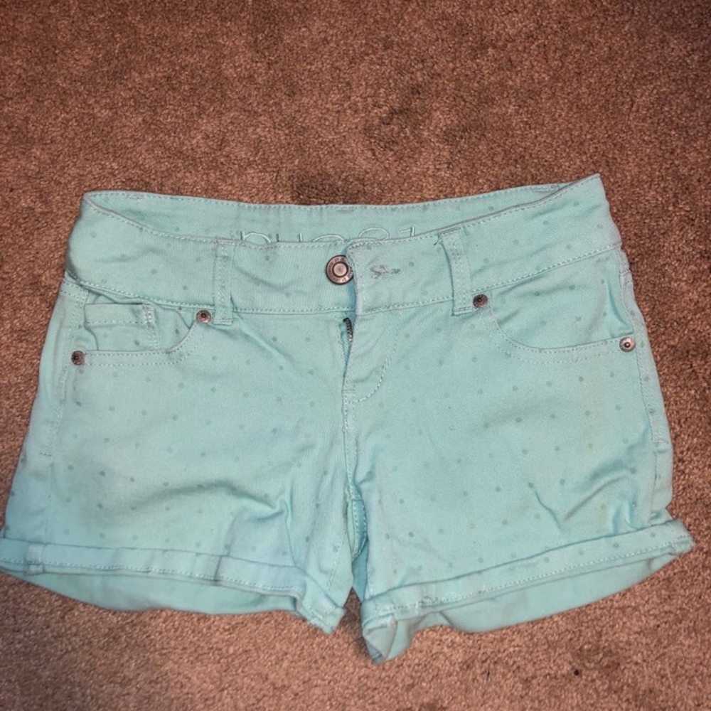 green polka dot shorts
